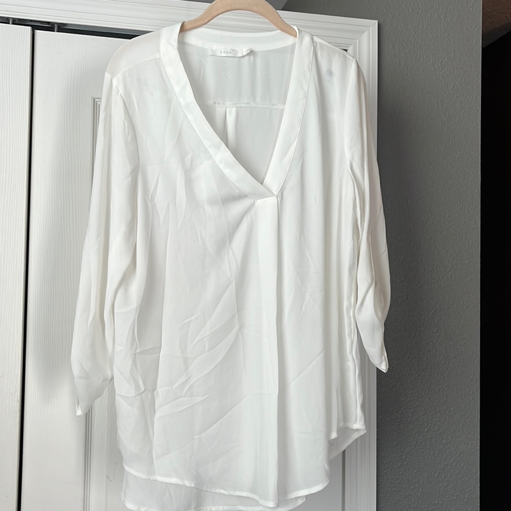 $20 High low sheer slightly off white light cream blouse size L